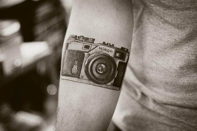 Person with black and brown tattoo on arm photo – Free Australia Image on  Unsplash